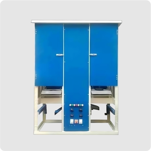 Double die paper plate making machine with a center motor